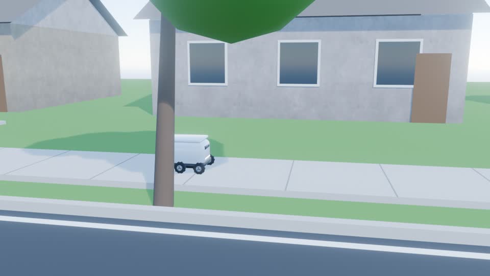 A small white delivery robot on a smooth suburban sidewalk, with a lawn and a house behind it